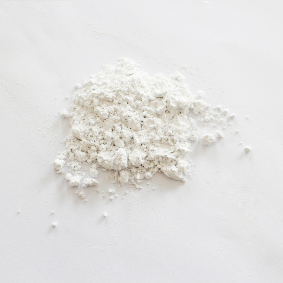 Low-priced calcium carbonate carrier additives