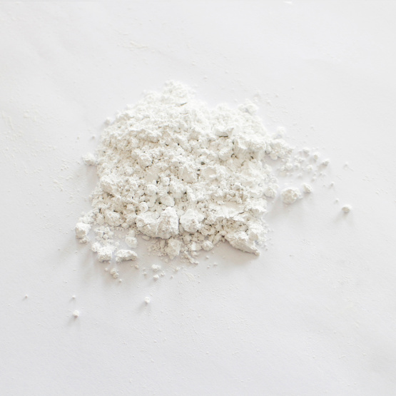 Dispersible good calcium carbonate carrier additives