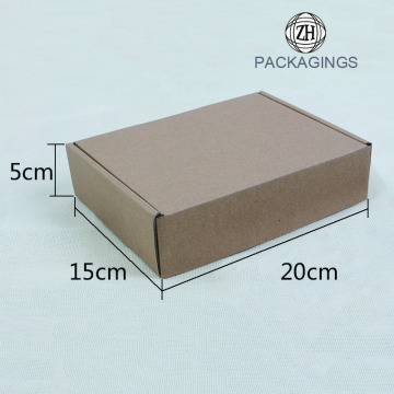 Small brown corrugated paper shipping boxes
