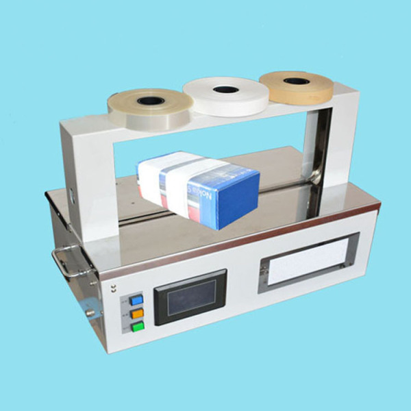 High speed banding machine for banding gifts