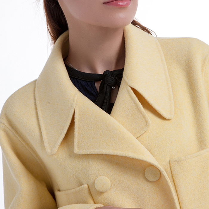 The collar of the new yellow cashmere winter coat