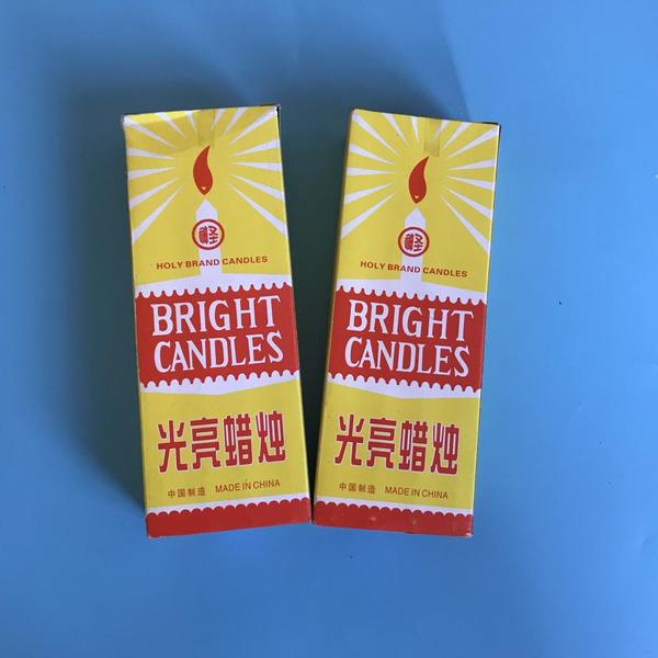 west africa selling bright holy candle bougies