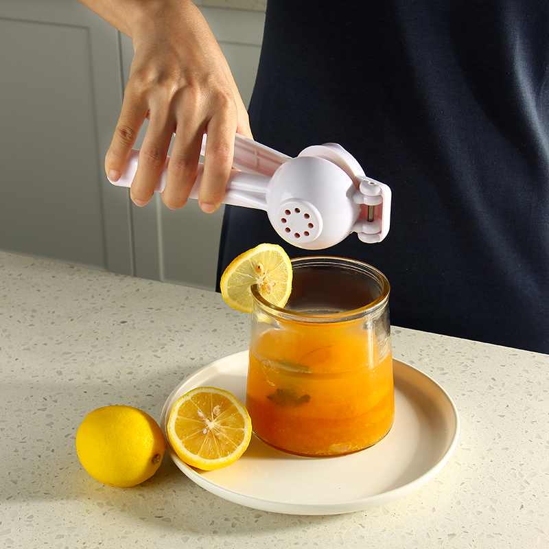 plastic orange hand manual press juicer strainer squeezer