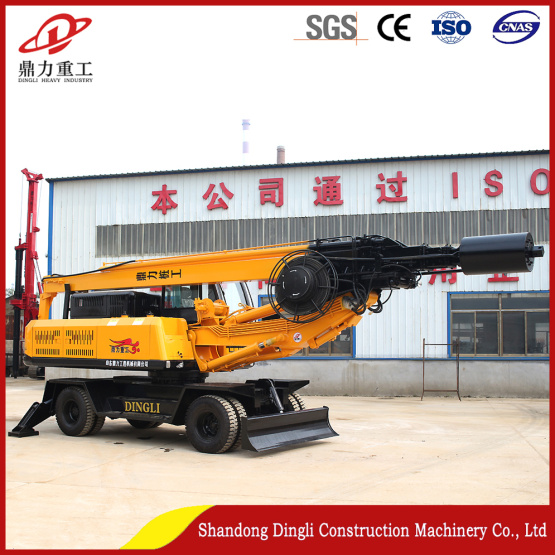 Wheel pile driver for road construction