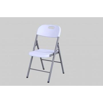 White plastic folding chair