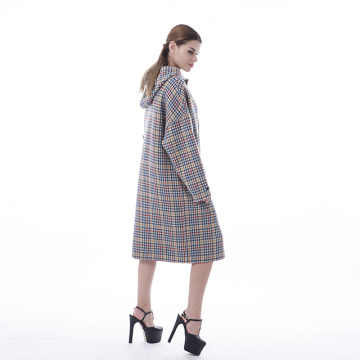 A long cashmere overcoat with thousand-bird checks