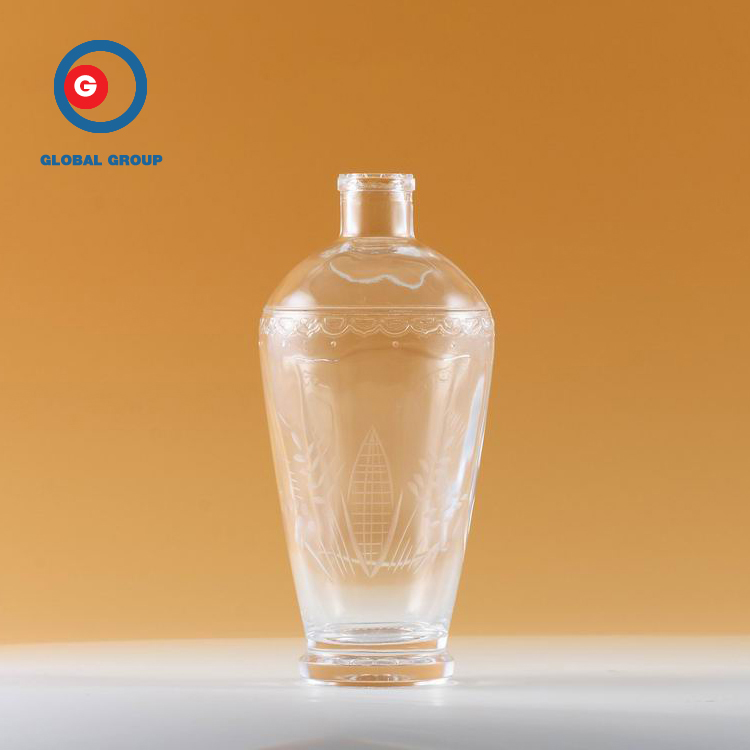 Hot Sale Round Shape Unique Carved Glass Transparent Bottle Glass Bottle 700ml