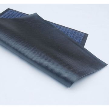 Gray ribbed door mat with PVC backing