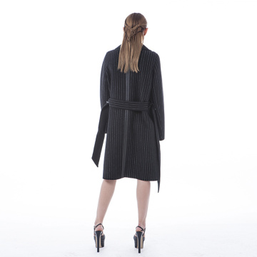 Mature black striped cashmere coat