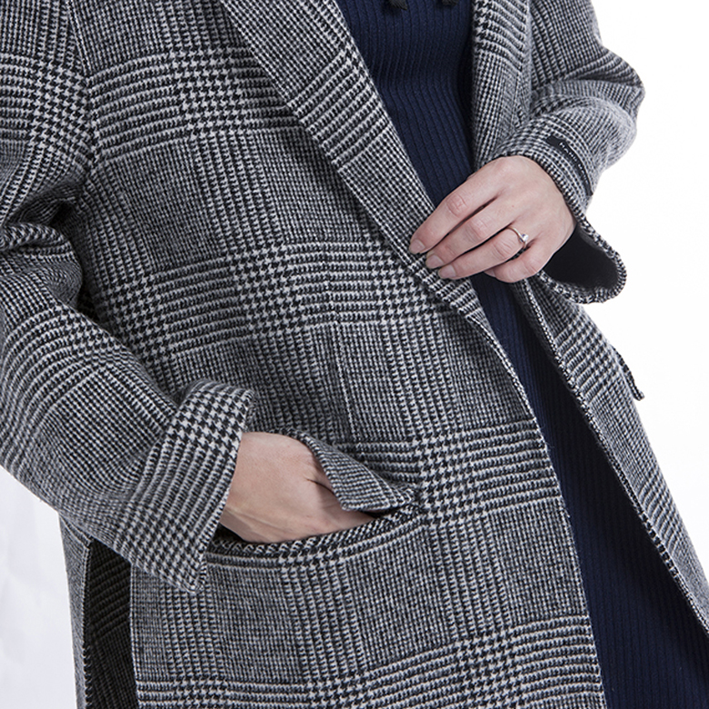 Pocket of fashionable striped cashmere overcoat