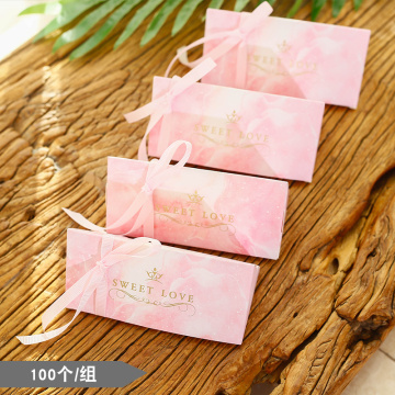 Small pink pyramid candy boxes