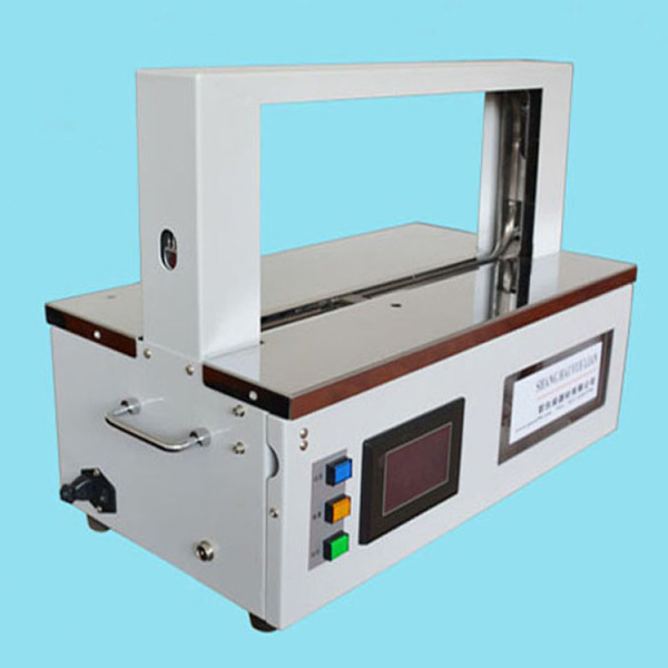 High speed banding machine for banding gifts