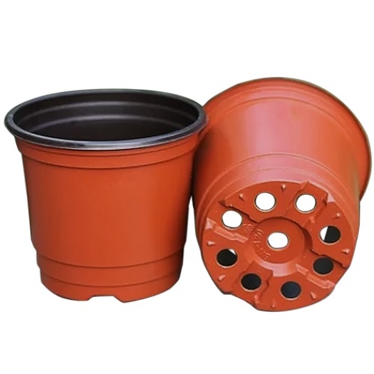 Red round plastic flower pots nursery pots