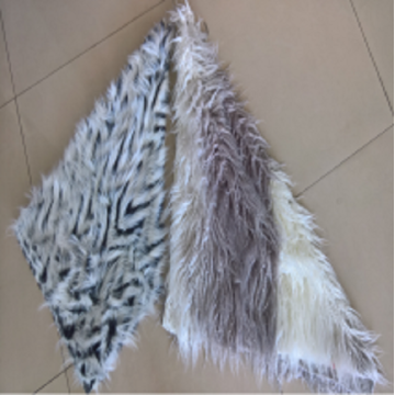 Jacquard weave and roller beam faux fur