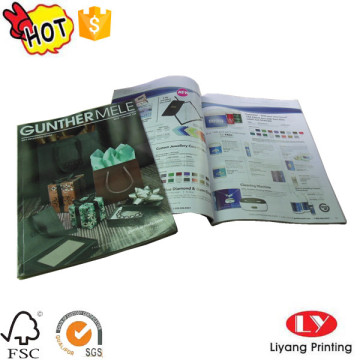 Softcover magazine brochure printing with glossy lamination