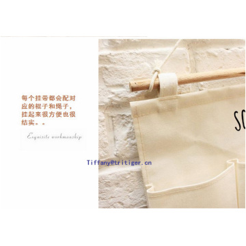 Hot selling fabric organizer hanging bag 100% cotton wall storage pocket