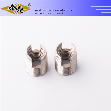 self tapping threaded inserts with cutting bores