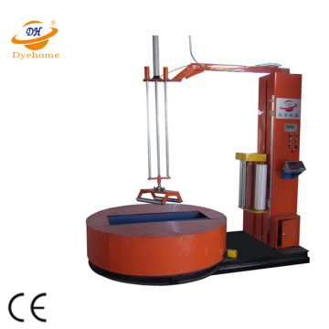 Automatic reel stretch wrapping machine