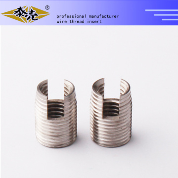 self tapping threaded inserts with cutting bores