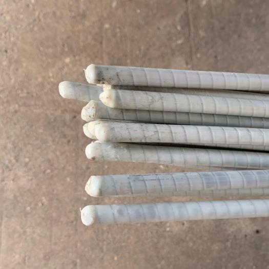 Plastic-wrapped stainless steel cable pins