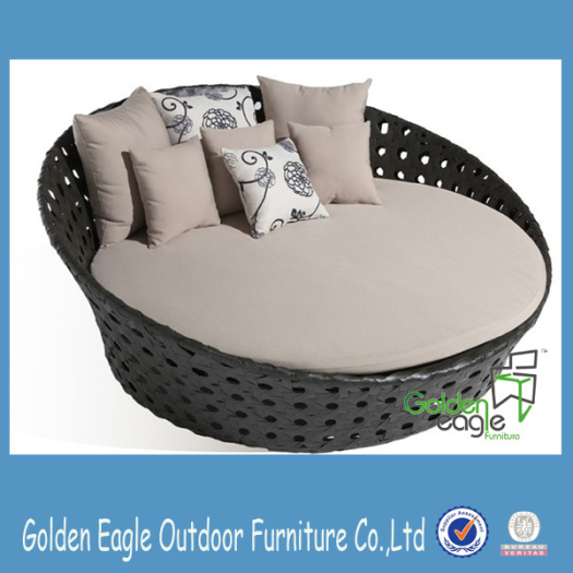 outdoor furniture round bed in garden