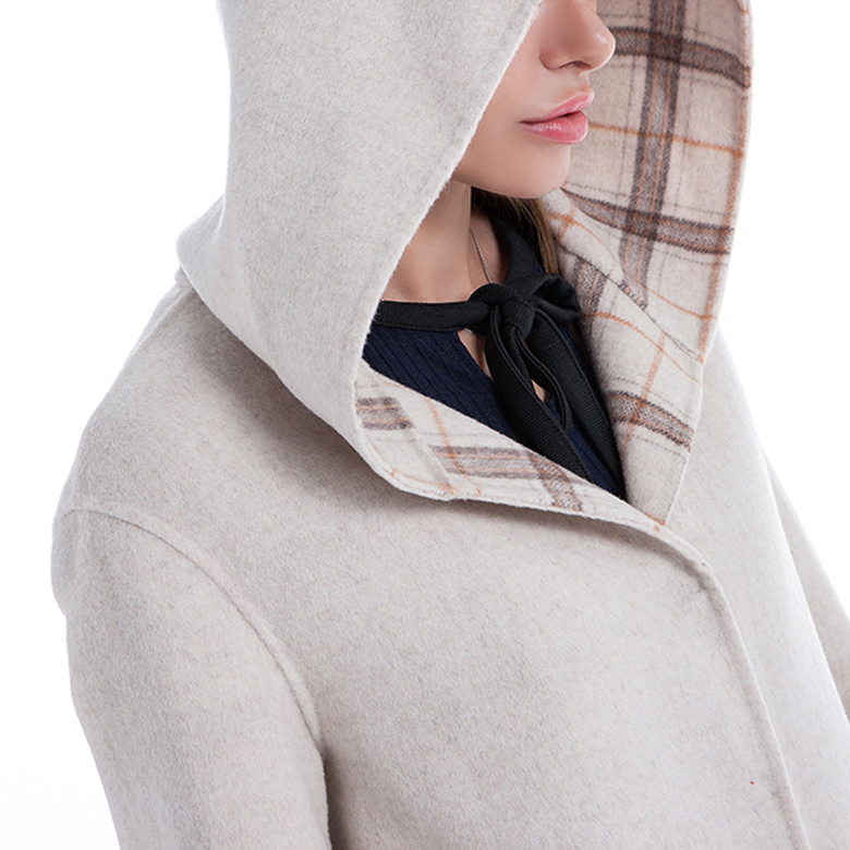 A cap for a white cashmere wool winter coat