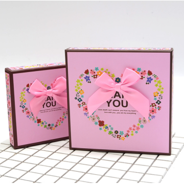 Pink chocolate box with paper divider