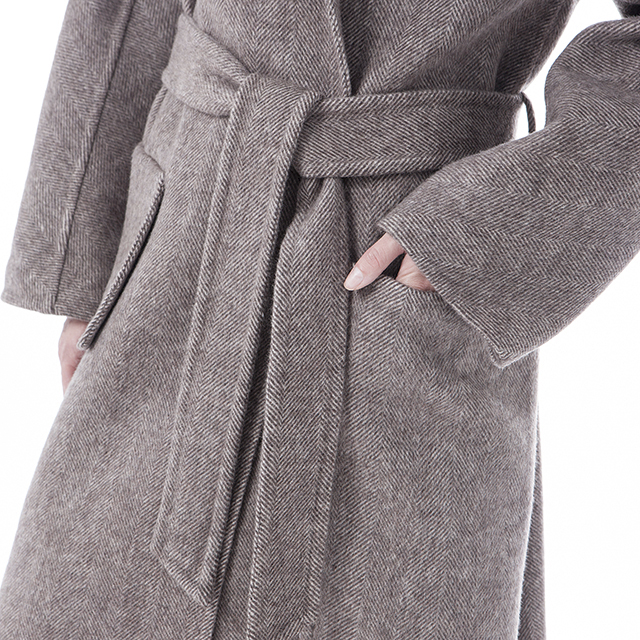 Underneath a cashmere overcoat