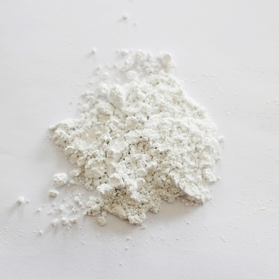 Silicone resin processing calcium carbonate carrier additive