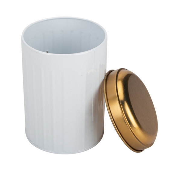 White and golden kitchen canister