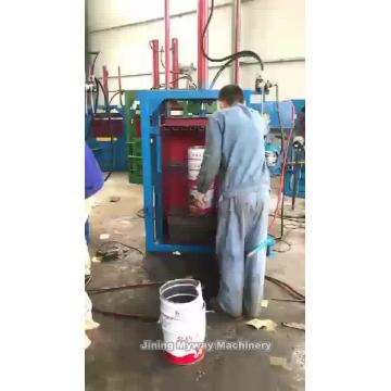 Vertical hydraulic baling machine for waste paper