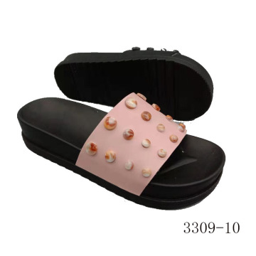 Black and pink button shoes