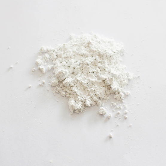 Dispersible good calcium carbonate carrier additives