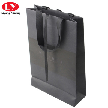 Black branded logo paper bag with ribbon