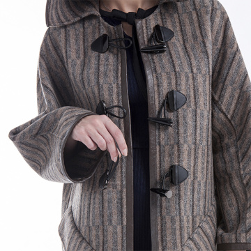 A cashmere coat with a hat