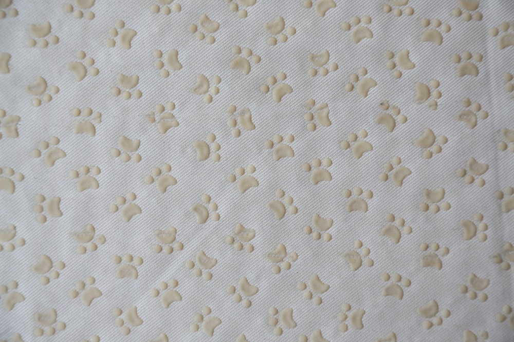 100% polyester plastic dots dog footprints fabric