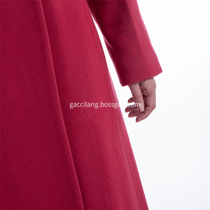 The sleeves of the new red winter dress