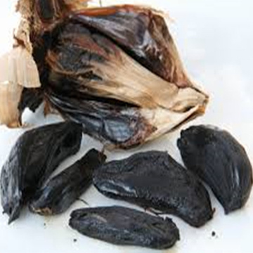 whole black garlic with sweet-and-sour
