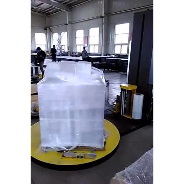 Automatic pallet wrapping machine with cut film