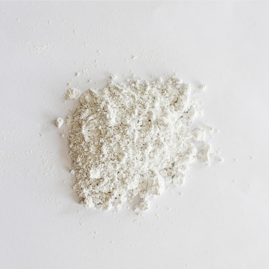 Odorless calcium carbonate carrier additive