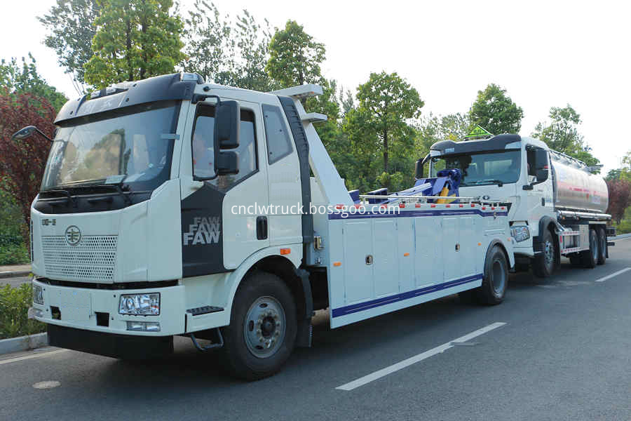 delivery trucks towing vehicles